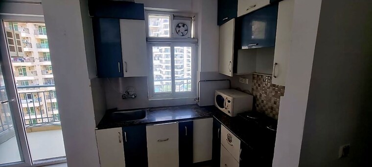 Kitchen, panchsheel-greens 2 Bedroom 945 Sq.Ft. Apartment In Sector 16 Greater Noida Greater Noida 10455144