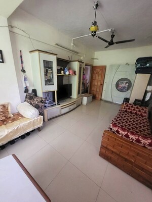 Living Room in 1 BHK Apartment at Apna Ghar CHS, Andheri East – for Rent