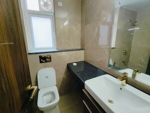 Bathroom in 2.5 BHK Apartment at Smart World Orchard, Sector 61 – for Rent