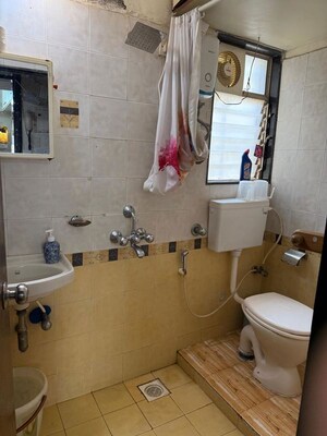 Bathroom in 1 BHK Apartment at Bhoomi Park II, Malad West – for Rent