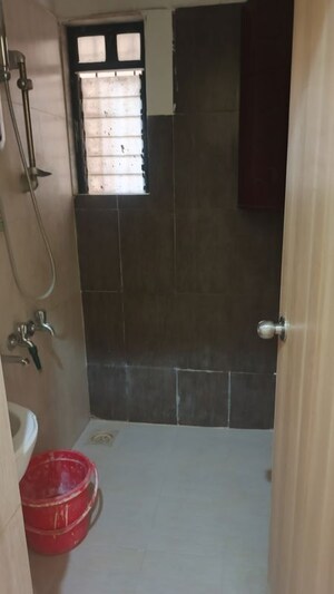 Bathroom in 1 BHK Apartment at Unnathi Woods Phase 1 And 2, Ghodbunder Road – for Rent