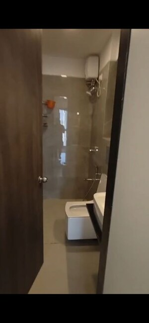 Bathroom in 2 BHK Apartment at Dev Leo Tower, Oshiwara – for Rent
