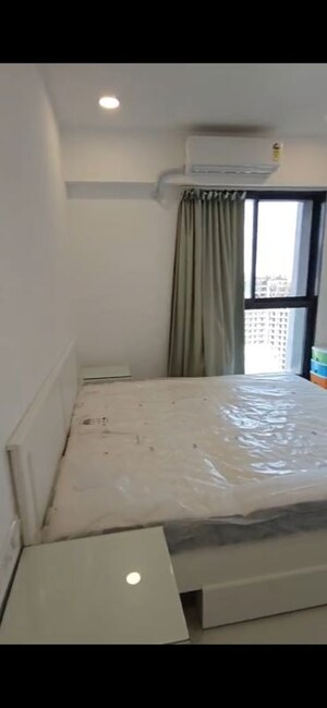 Bedroom in 2 BHK Apartment at Dev Leo Tower, Oshiwara – for Rent