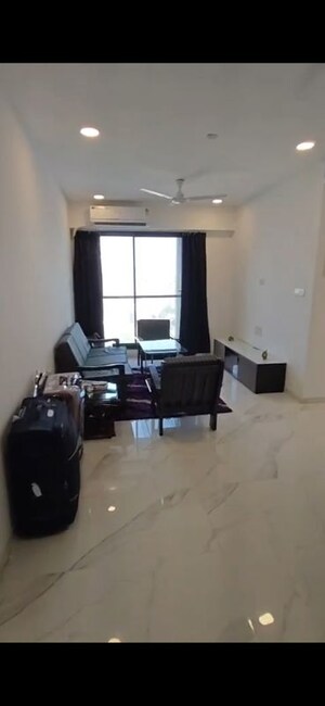 Living Room in 2 BHK Apartment at Dev Leo Tower, Oshiwara – for Rent