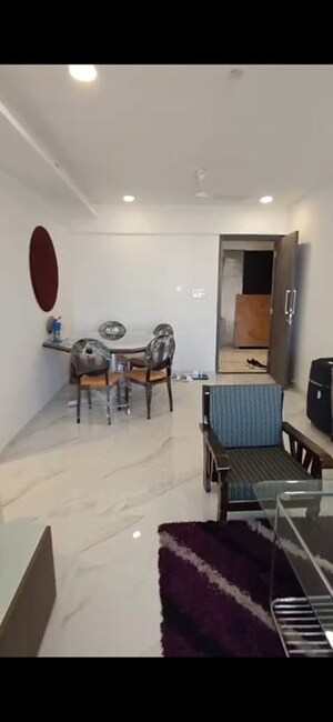 Team Area in 2 BHK Apartment at Dev Leo Tower, Oshiwara – for Rent