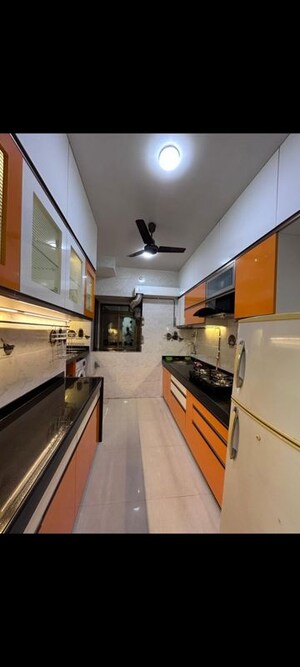 Kitchen in 2 BHK Apartment at Runwal Garden City, Balkum Pada – for Rent
