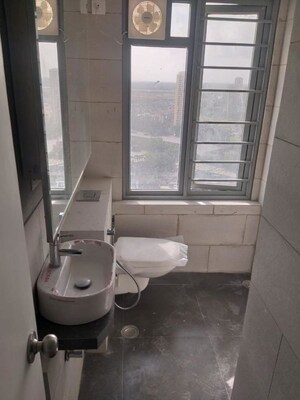 Bathroom in 2 BHK Apartment at Empire Towers, Goregaon East – for Rent