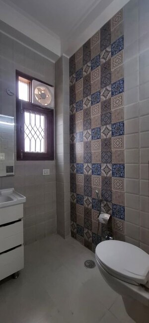 Bathroom in 3 BHK Builder Floor at Kalkaji – for Rent