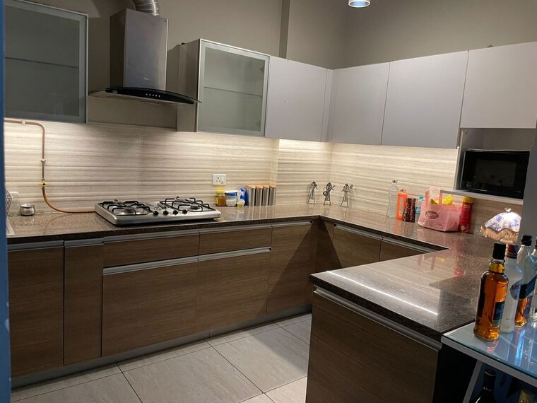 Kitchen, aba-cleo-county 4 Bedroom 2448 Sq.Ft. Apartment In Sector 121 Noida 10455433