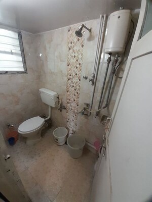 Bathroom in 2 BHK Apartment at Sanskruti Anand, Prabhat Road – for Rent