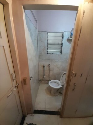 Bathroom in 2 BHK Apartment at Sanskruti Anand, Prabhat Road – for Rent