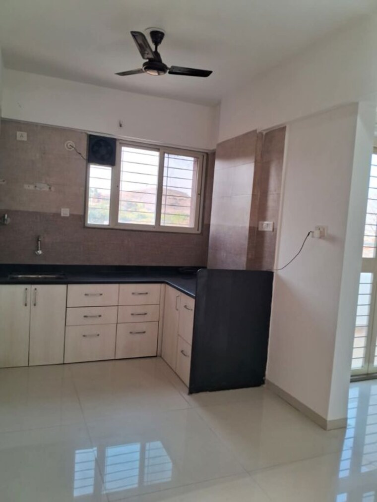 Kitchen, arun-sane-orchid-towers 3 Bedroom 1200 Sq.Ft. Apartment In Baner Pune 10455502