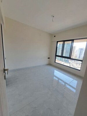 Bedroom in 2 BHK Apartment at Paradigm Antalya, Oshiwara – for Rent