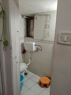 Bathroom in 2 BHK Apartment at Manish Tower, Andheri West – for Rent