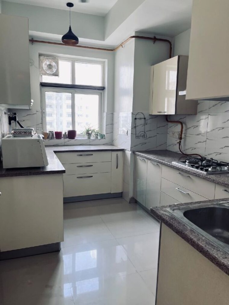 Kitchen, emaar-mgf-the-palm-drive-studios 3.5 Bedroom 1950 Sq.Ft. Apartment In Sector 66 Gurgaon 10455690