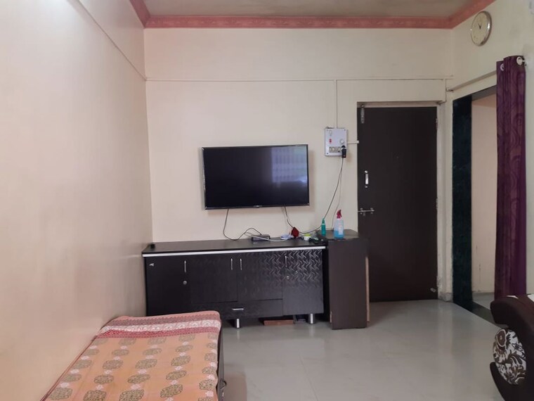 Living Room, mantri-park-i-and-ii 1 RK 400 Sq.Ft. Apartment In Kothrud Pune 10455725