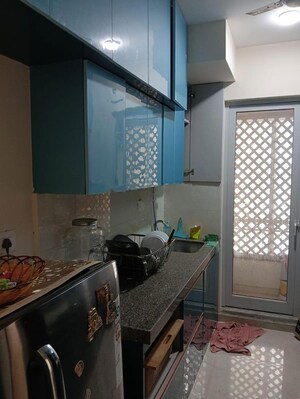 Kitchen in 2 BHK Apartment at Piramal Vaikunth, Balkum Pada – for Rent