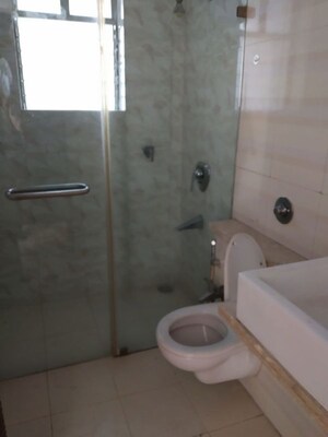 Bathroom in 4 BHK Apartment at Navin Nagar – for Sale