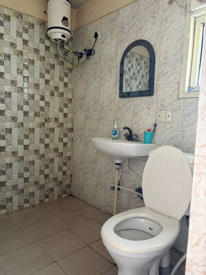 Bathroom in 3.5 BHK Apartment at Antriksh Golf View, Sector 78 – for Rent