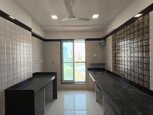 Kitchen in 2 BHK Apartment at Triumph Tower, Malad West – for Sale