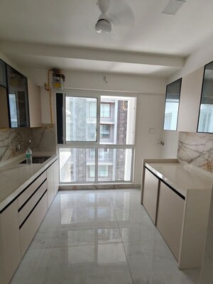 Kitchen in 2 BHK Apartment at Unique Aura Mumbai, Santacruz West – for Sale