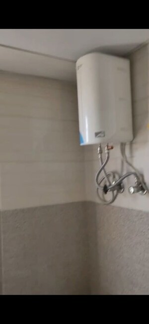 Bathroom in 2 BHK Apartment at Signature Orchard Avenue 2, Sector 93 – for Rent