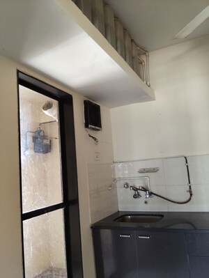 Kitchen in 2 BHK Apartment at HUBTOWN GARDENIA ROSEWOOD & REDWOOD CHS LTD, Mira Road – for Sale