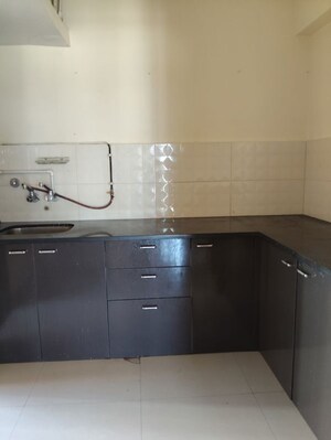 Kitchen in 2 BHK Apartment at HUBTOWN GARDENIA ROSEWOOD & REDWOOD CHS LTD, Mira Road – for Sale