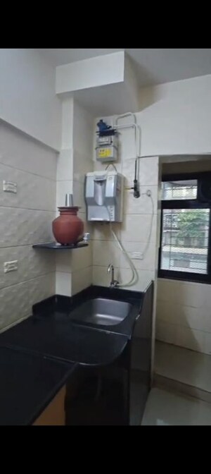Kitchen in 2 BHK Apartment at Serenity Complex, Andheri West – for Rent