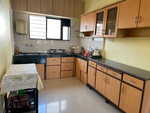 Kitchen in 2 BHK Apartment at Dahanukar Colony – for Rent