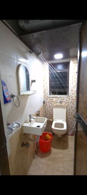 Bathroom in 1 BHK Apartment at Royal Palms, Goregaon East – for Rent