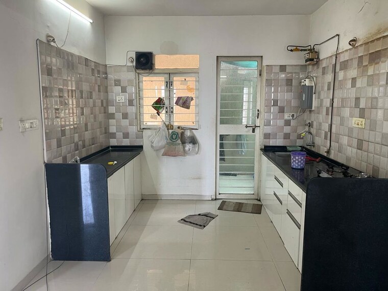 Kitchen, shriram-la-tierra 2 Bedroom 1100 Sq.Ft. Apartment In Vishrantwadi Pune 10456250