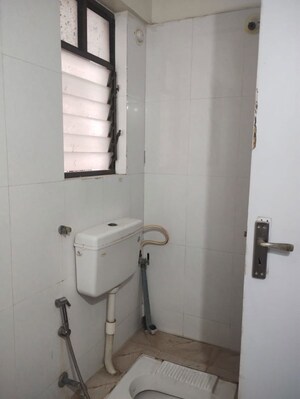 Bathroom in 3 BHK Apartment at Arun Sane Orchid Towers, Baner – for Rent