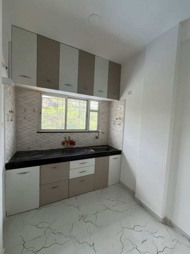 Kitchen, jay-ganesh-apartment 1 Bedroom 584 Sq.Ft. Apartment In Kharadi Pune 10456523