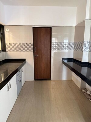 Kitchen in 2 BHK Apartment at Siddhesh Optimus, Viman Nagar – for Sale