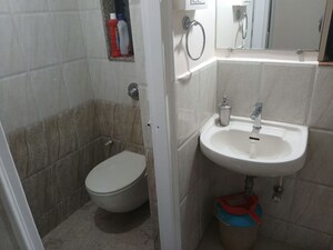 Bathroom in 1 BHK Apartment at New Hill View CHS, Kasarvadavali – for Rent