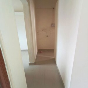 Building Lobby in 1 BHK Apartment at Wadgaon Sheri – for Rent