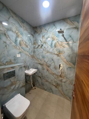 Bathroom in 3.5 BHK Builder Floor at Raj Nagar Extension – for Sale