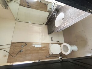 Bathroom in 3 BHK Builder Floor at Ansal API Esencia, Sector 67 – for Rent