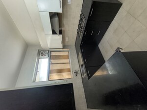 Kitchen in 3 BHK Builder Floor at Ansal API Esencia, Sector 67 – for Rent