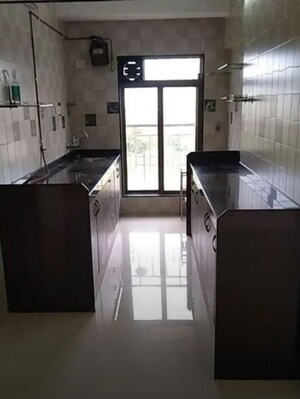 Kitchen in 1 BHK Apartment at K Raheja Palm Spring, Malad West – for Rent