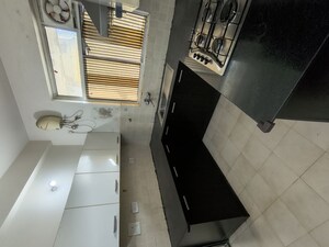 Kitchen in 3 BHK Builder Floor at Ansal API Esencia, Sector 67 – for Rent