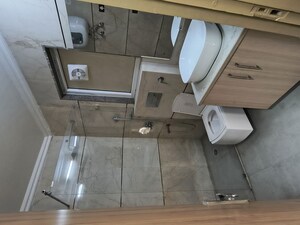 Bathroom in 3 BHK Builder Floor at Ansal API Esencia, Sector 67 – for Rent