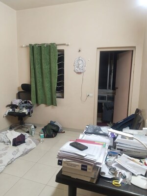 Living Room in 1 BHK Apartment at Gita Society, Camp – for Rent