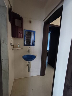 Bathroom in 2 BHK Apartment at Grandeur Giriraj Jewel, Talav Pali – for Rent