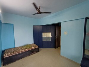 Bedroom in 2 BHK Apartment at Grandeur Giriraj Jewel, Talav Pali – for Rent