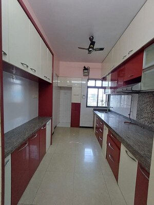 Kitchen in 2 BHK Apartment at Grandeur Giriraj Jewel, Talav Pali – for Rent