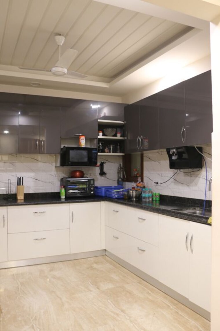 Kitchen, malibu town 4 Bedroom 250 Sq.Yd. Builder Floor In Malibu Town Gurgaon 10457124
