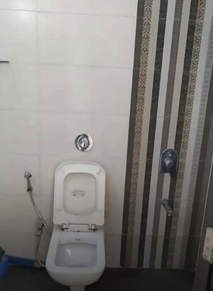 Bathroom in 2 BHK Apartment at Lotus Lotus Link Square, Malad West – for Rent