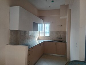 Kitchen in 2 BHK Apartment at Amrapali Dream Valley – for Rent